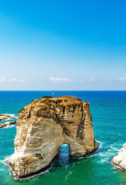 Pigeon Rocks rising from the Mediterranean Sea in Beirut, Lebanon